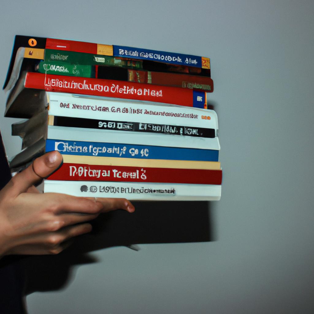 Person holding multiple language books